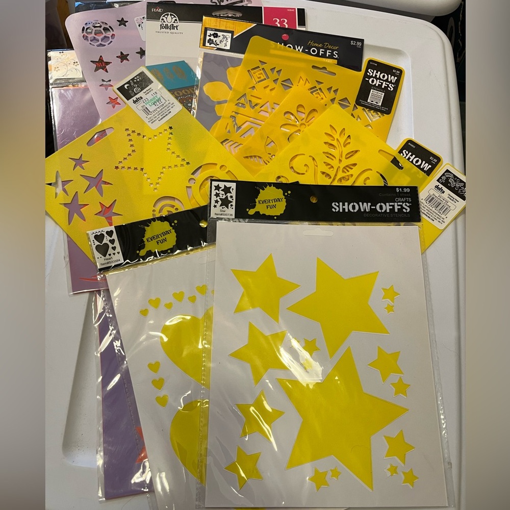 NWT stencils. 10+ stencil sheets, flowers, stars, hearts, sports.